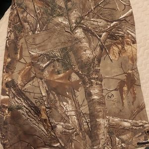 Men's Realtree camo pants with cargo pockets and drawstring ankles.